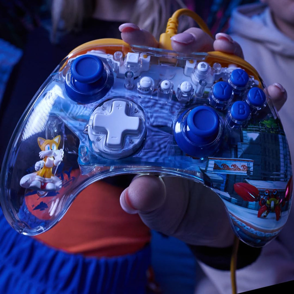 PDP REALMz Nintendo Switch Pro Controller. Customizable LED Lighting. 3.5mm Headphone Jack. Officially Licensed by Nintendo and SEGA