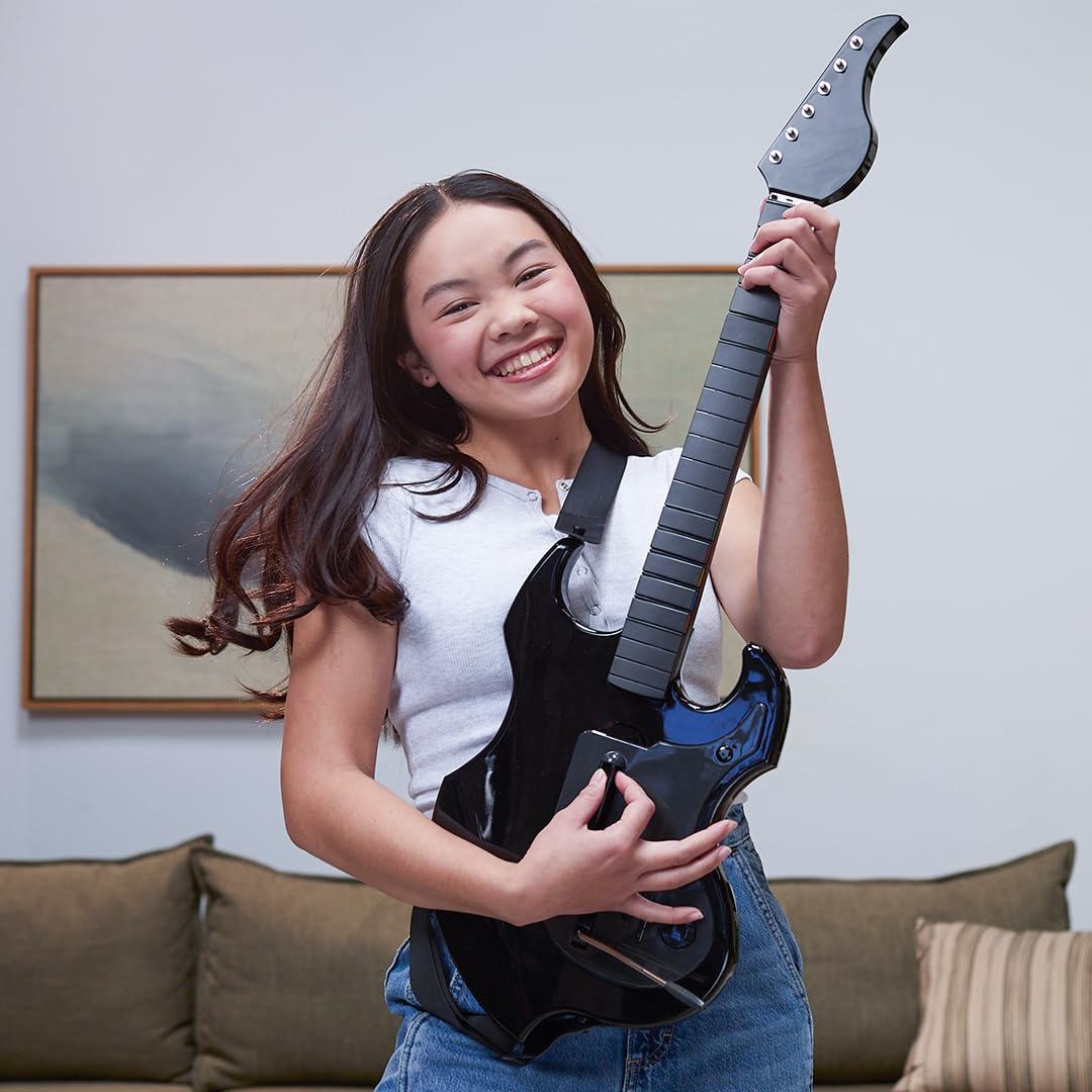 PDP Riffmaster Wireless Guitar Controller for Nintendo Switch 2. Lite. OLED | Licensed for Switch. Fortnite Festival. Rechargeable 40-Hr Battery. Collapsible Design. 2 Mappable Buttons. Audio Jack. Black